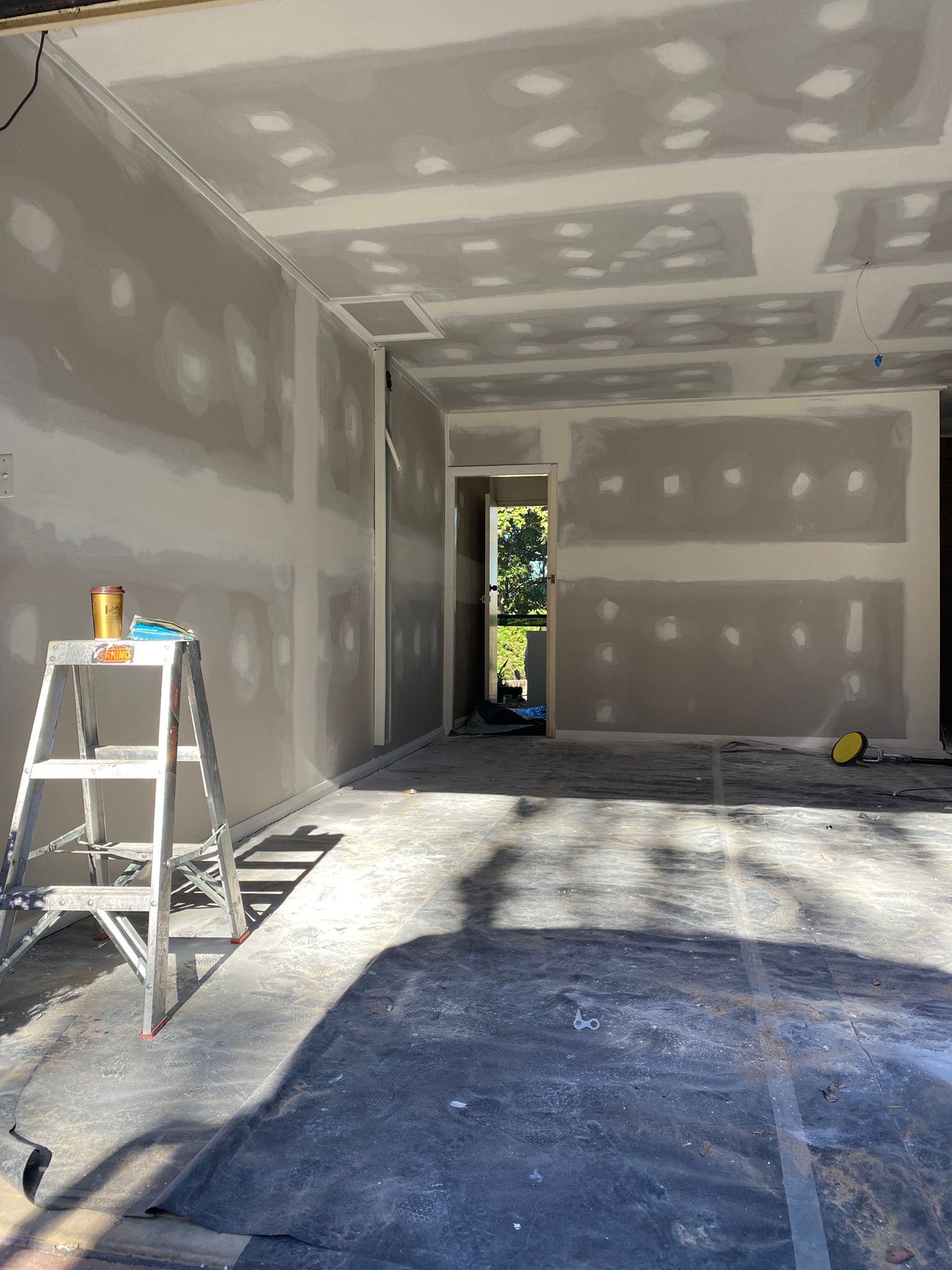 Plasterboard walls and ceiling set and ready for paint – Diagrid Constructions